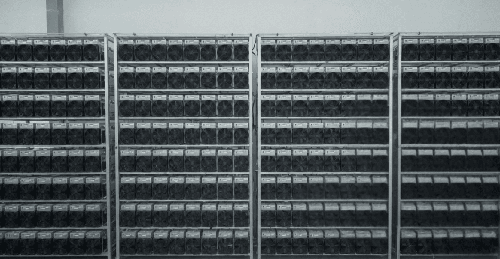 Neat racks of client-owned miners